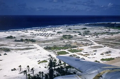 Hastings TG 582 overflying the living quarters, Christmas Island , July 1956